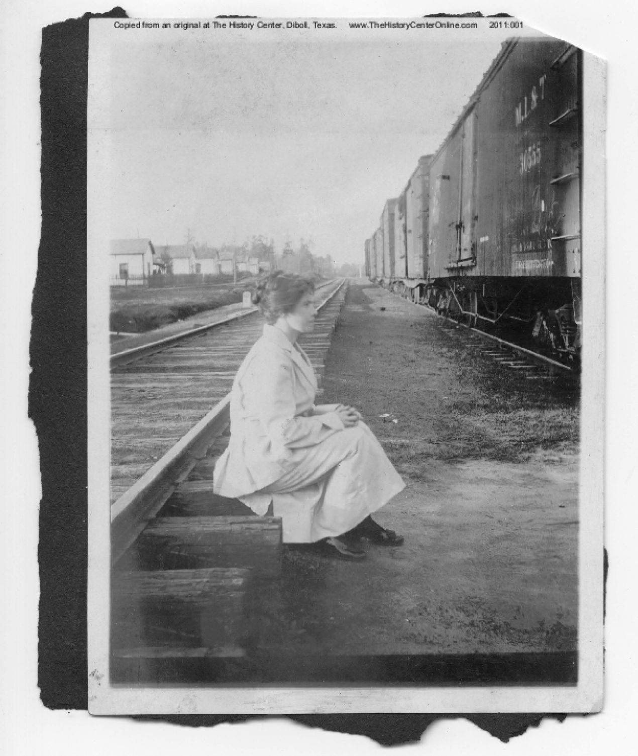 043 Woman on railroad track