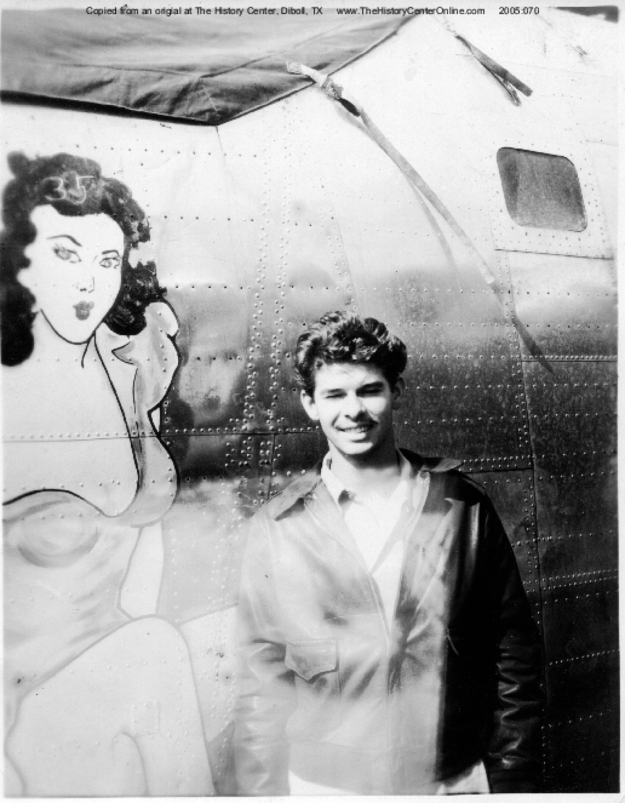 Gayle Cruthirds with B-24 Nose Art, 1944
