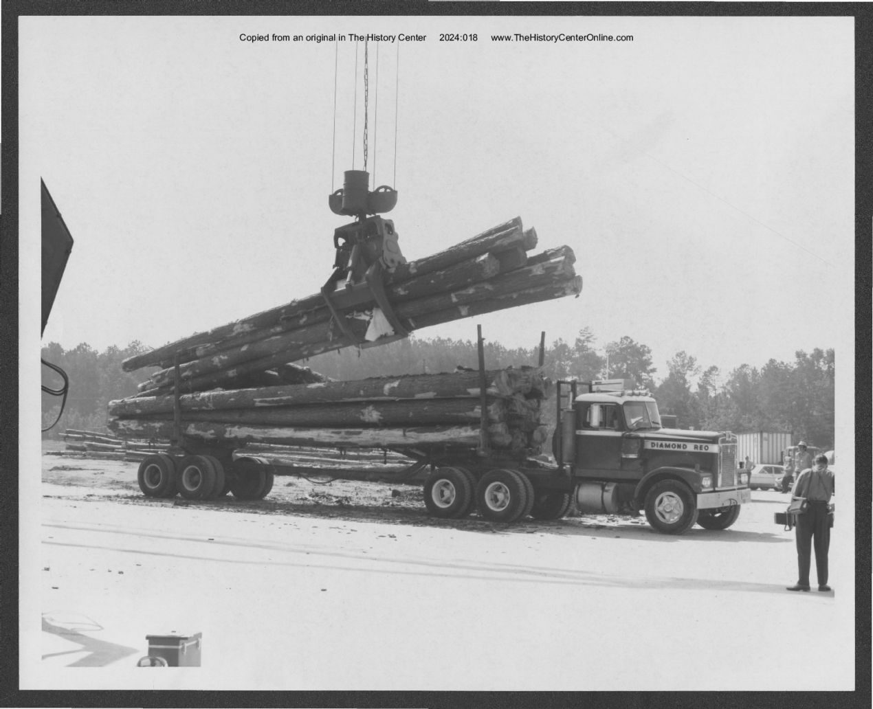 03_2024_018_First_Load_of_Plywood_Logs_Offloading_2_Owens_Illinois_Jasper_Texas_June_23_1971