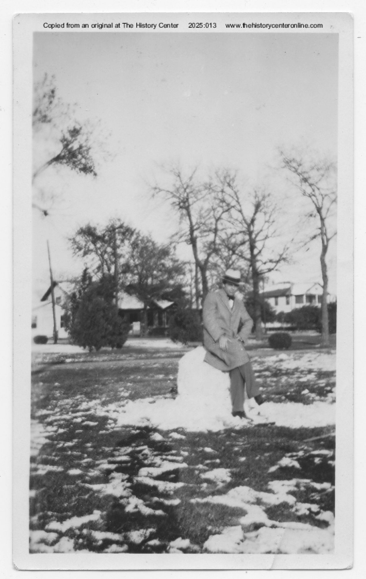 1927, Man Sitting Snow