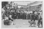 1946, Lufkin Industries Inc. employees standing around Jake Ross' dog, Lufkin, Texas, ca.