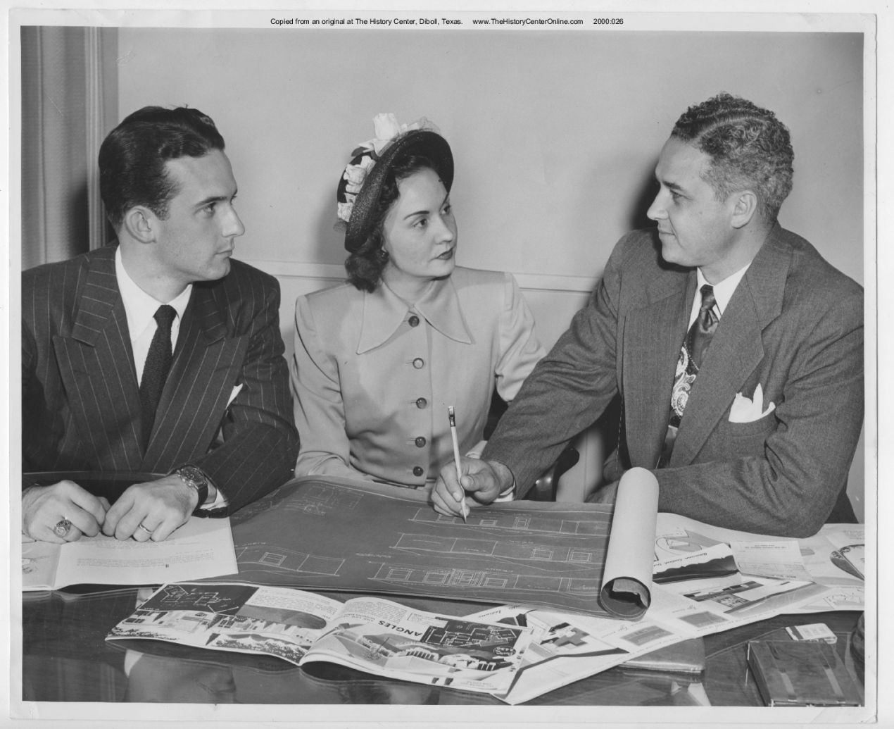 undated, Young couple viewing home building plans, by Jack Laws
