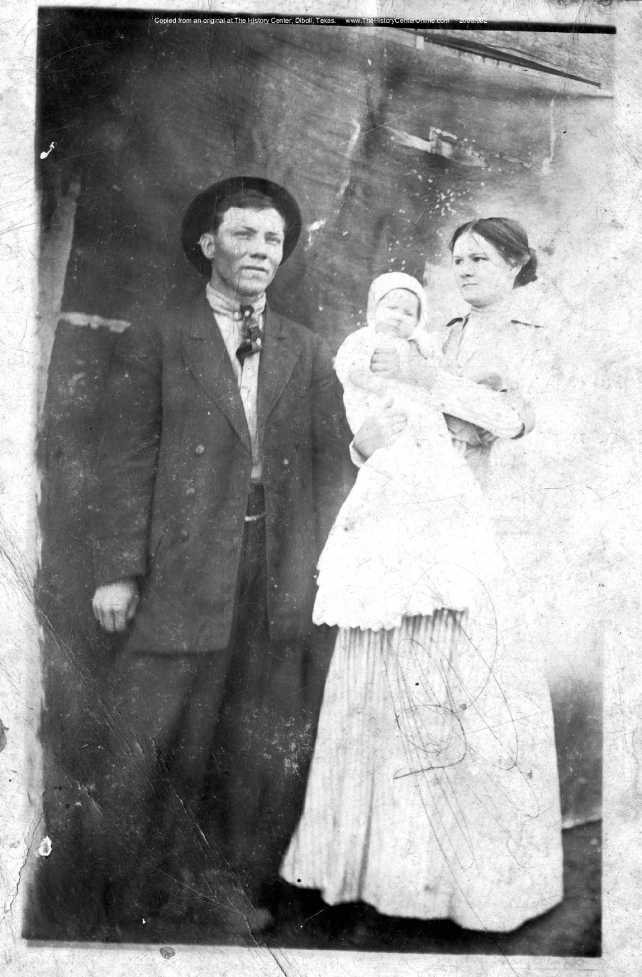029 unknown couple with baby